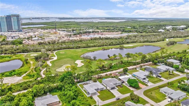 a view of a city with an ocean view