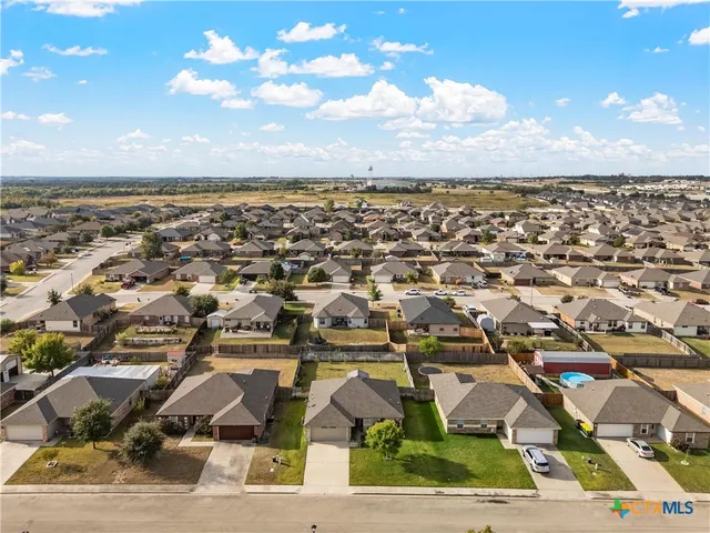 an aerial view of multiple house