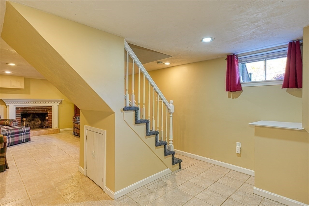 238 West Hill Road Marlborough, MA 01752 - Photo 17 of 30 a view of entryway and hall with wooden floor