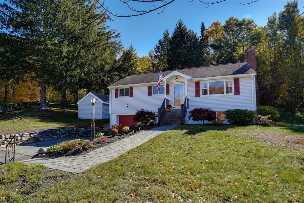 238 West Hill Road Marlborough, MA 01752 - Photo 25 of 30 a view of a house with swimming pool and a yard