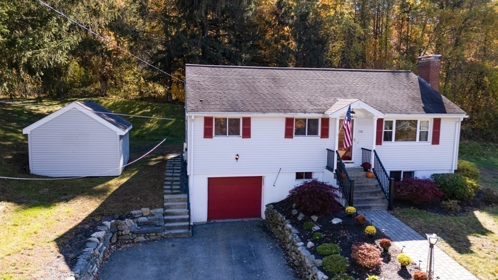 238 West Hill Road Marlborough, MA 01752 - Photo 29 of 30 a aerial view of a house with a yard