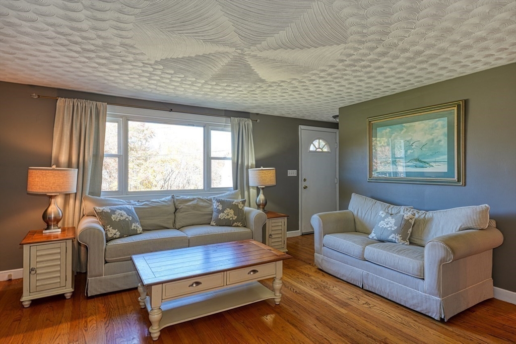 238 West Hill Road Marlborough, MA 01752 - Photo 4 of 30 a living room with furniture and a window