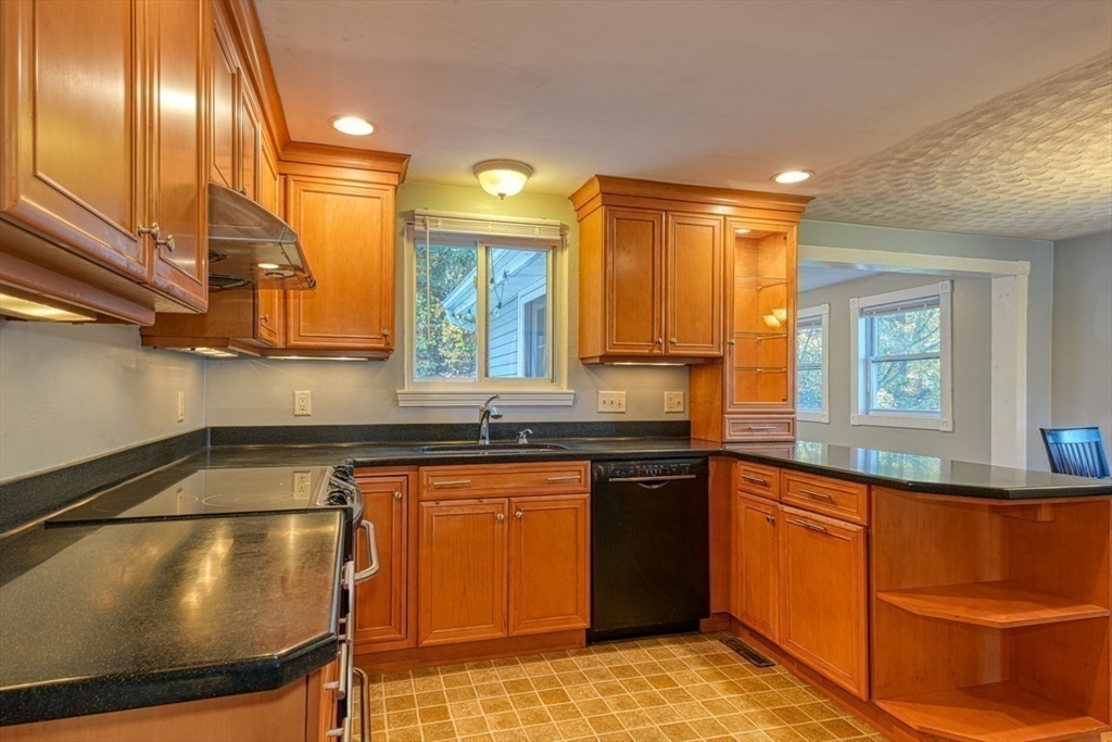 238 West Hill Road Marlborough, MA 01752 - Photo 5 of 30 a kitchen with a sink cabinets and window