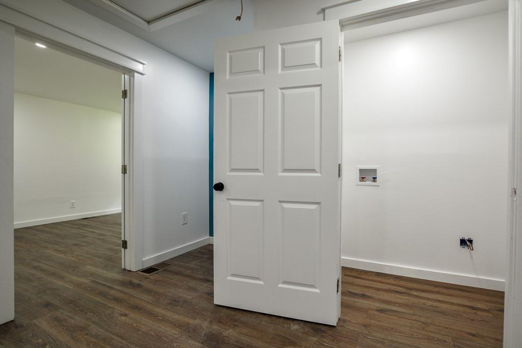 3349 Calhoun Road Northeast Rome, GA 30161 - Photo 13 of 30 an empty room with wooden floor and closet