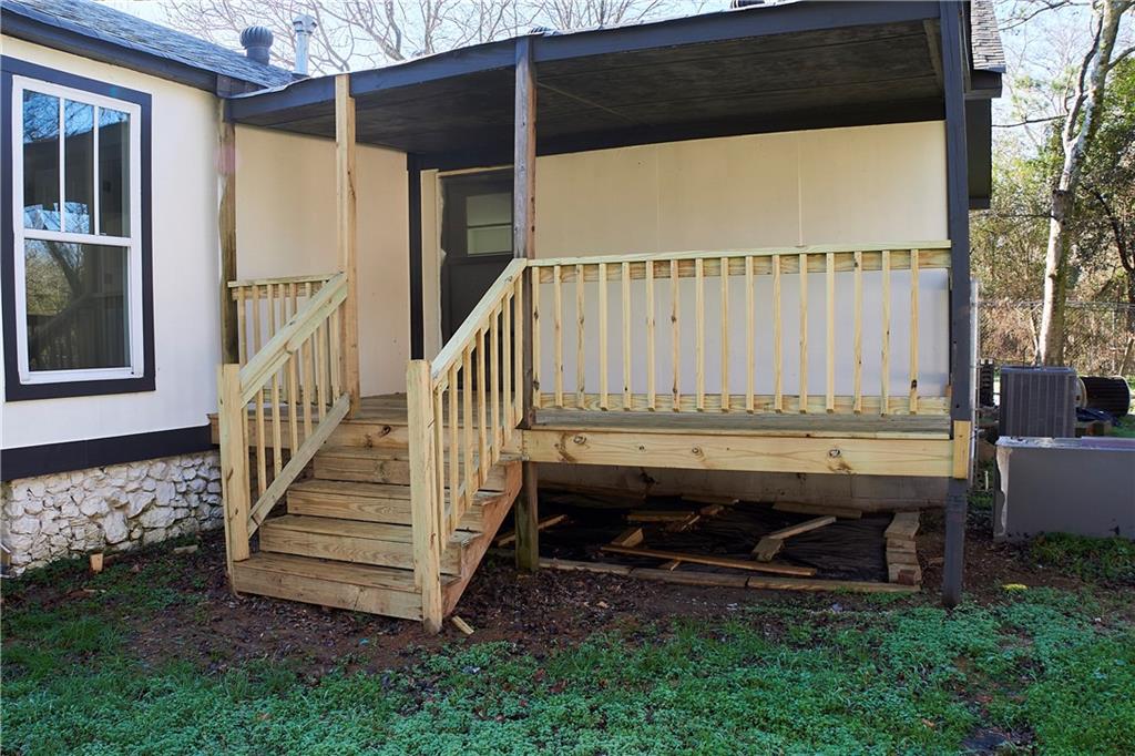 3349 Calhoun Road Northeast Rome, GA 30161 - Photo 29 of 30 a view of balcony with wooden floor and fence