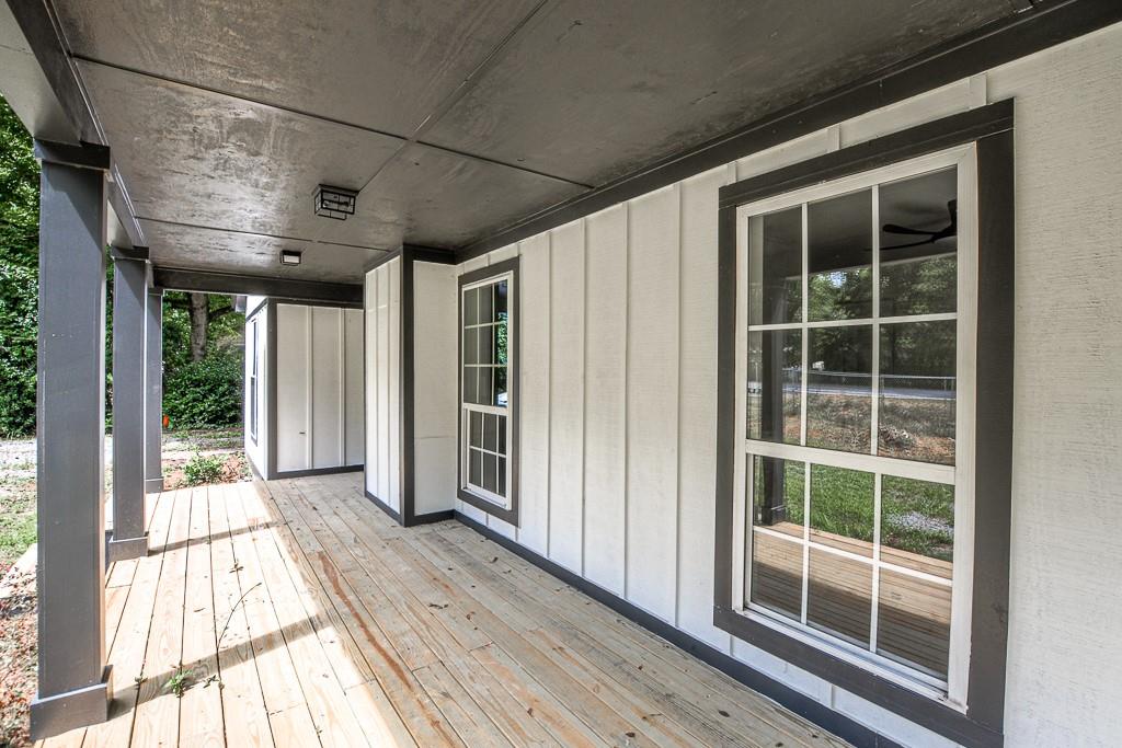 3349 Calhoun Road Northeast Rome, GA 30161 - Photo 4 of 30 a view of balcony with wooden floor