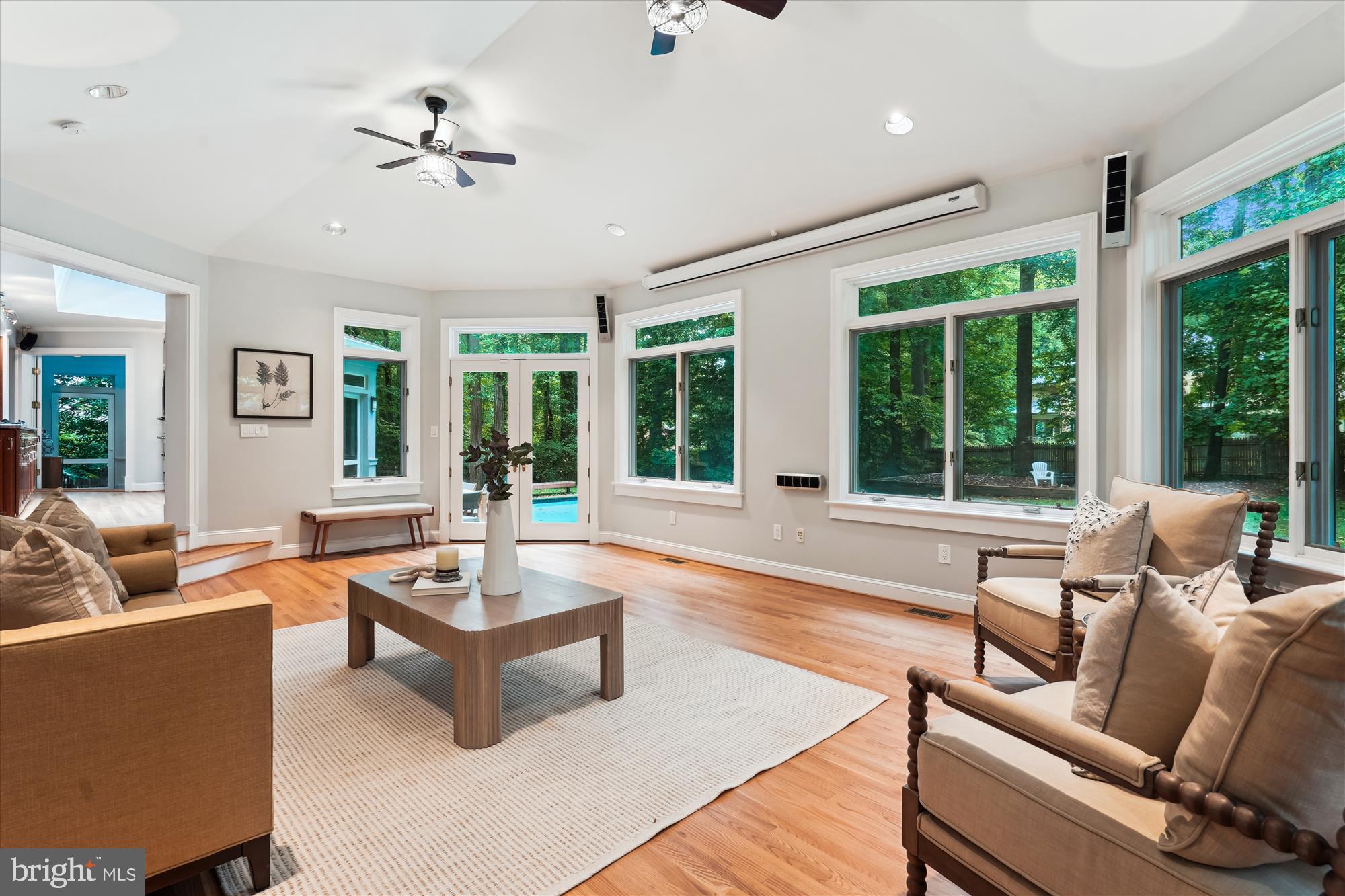 2559 Five Oaks Road Vienna, VA 22181 - Photo 16 of 55 a living room with furniture and floor to ceiling windows