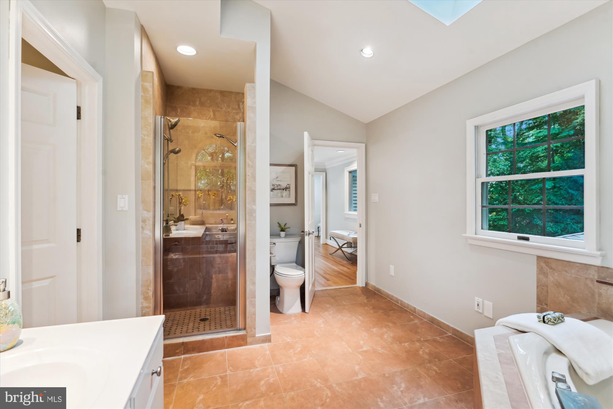 2559 Five Oaks Road Vienna, VA 22181 - Photo 28 of 55 a bedroom with a bed and a large window