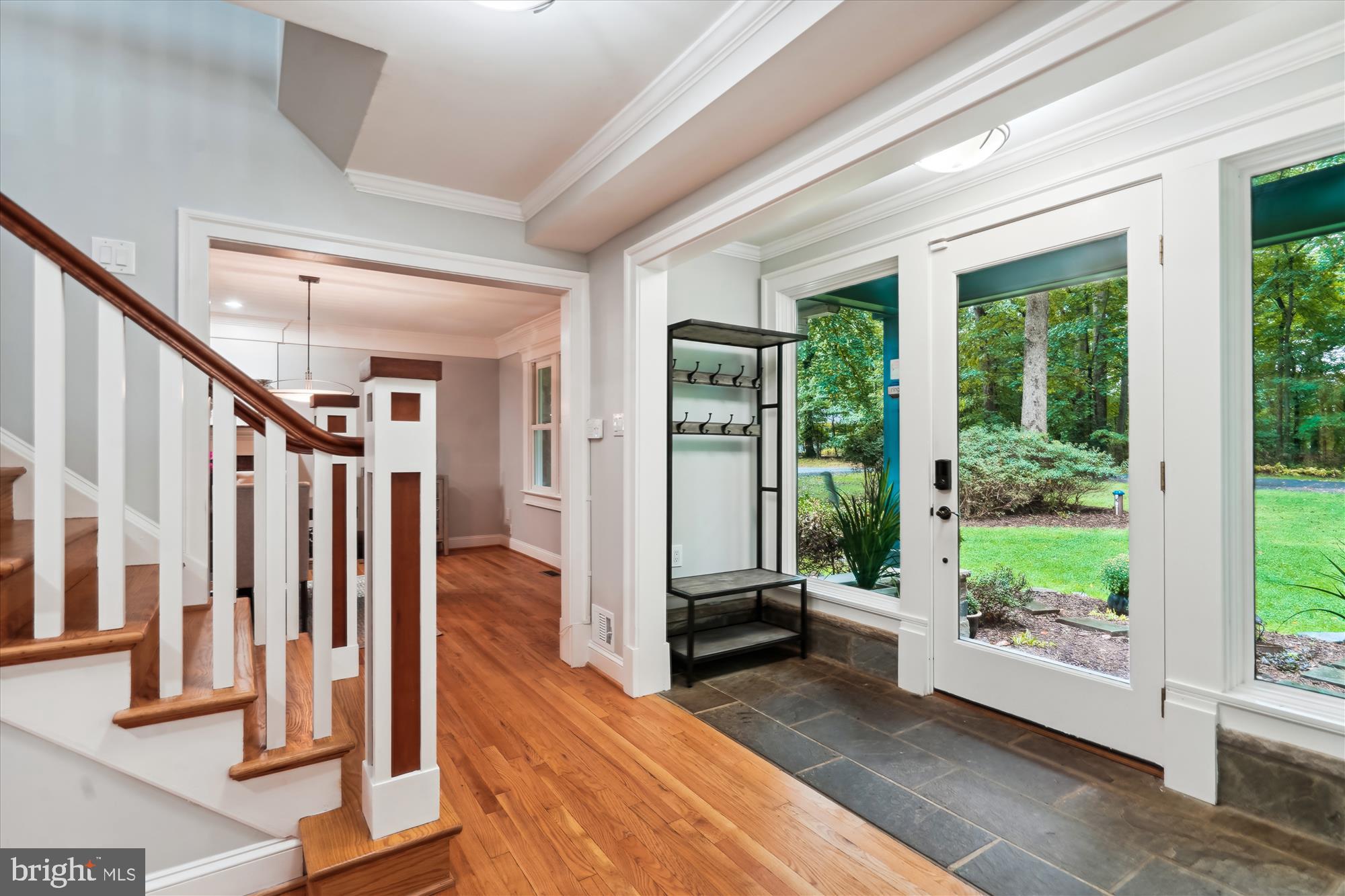 2559 Five Oaks Road Vienna, VA 22181 - Photo 3 of 55 a view of an entryway with wooden floor and windows