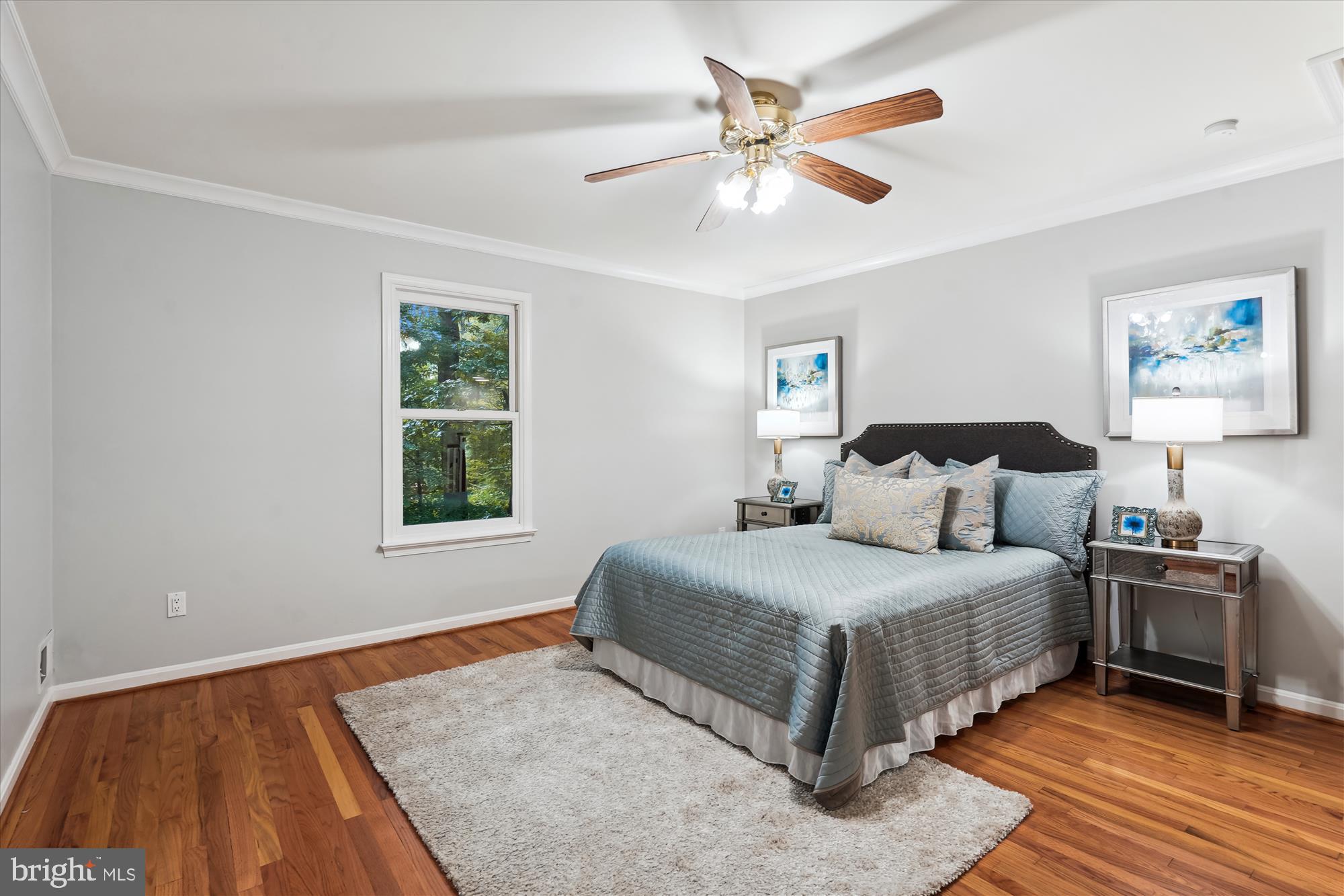 2559 Five Oaks Road Vienna, VA 22181 - Photo 32 of 55 a bedroom with a large bed and a window
