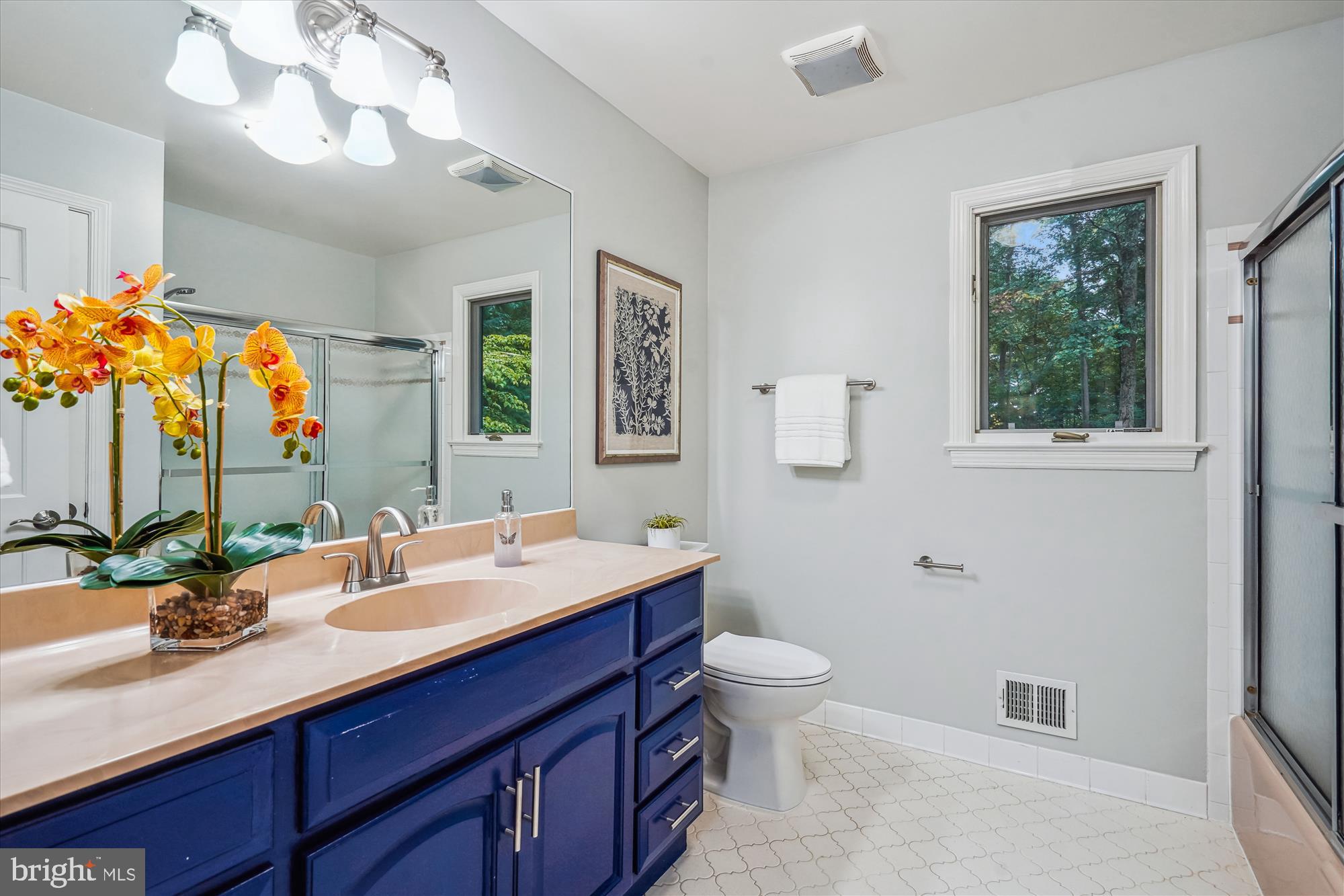 2559 Five Oaks Road Vienna, VA 22181 - Photo 33 of 55 a bathroom with a double vanity sink mirror and toilet