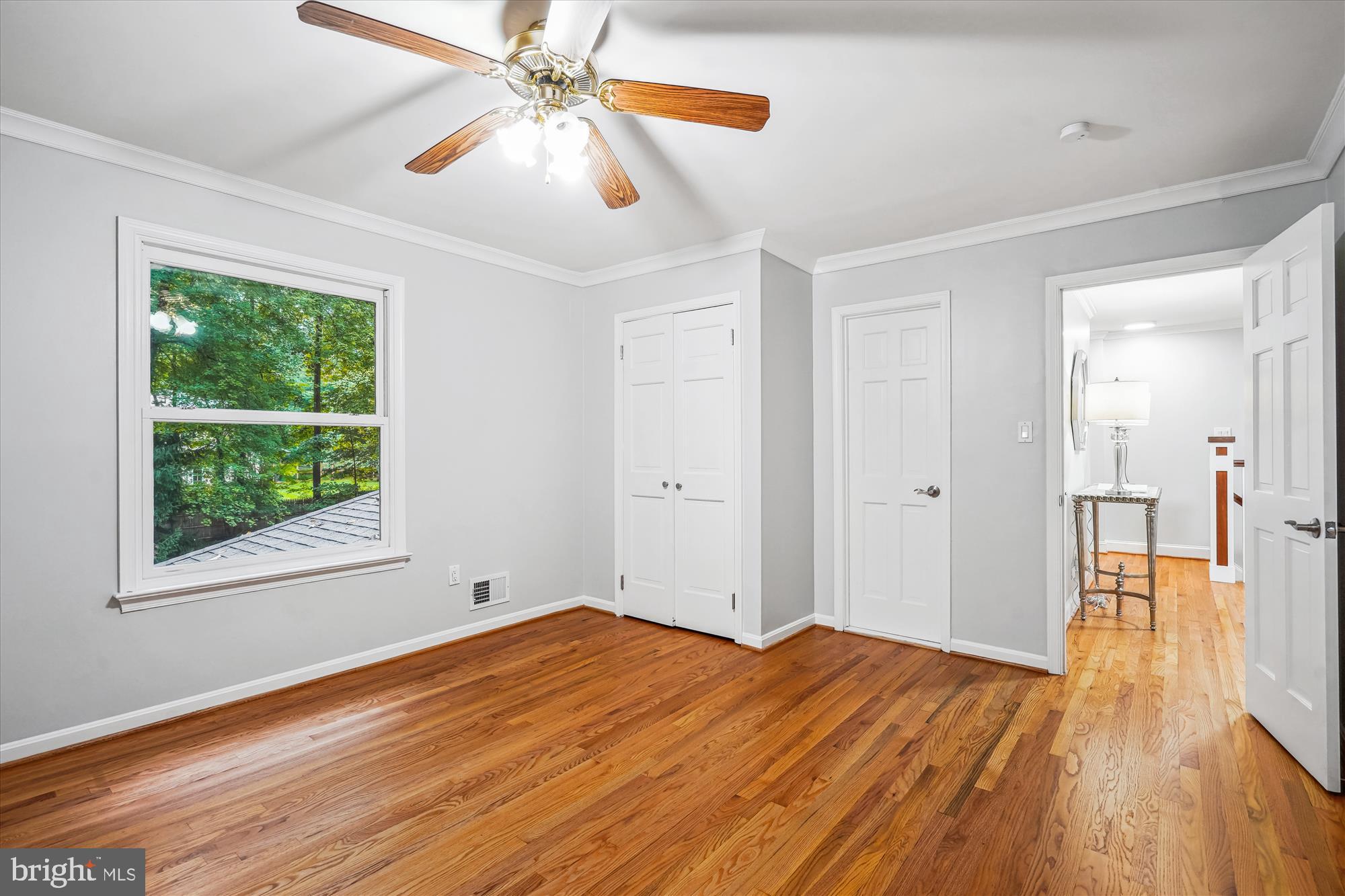 2559 Five Oaks Road Vienna, VA 22181 - Photo 34 of 55 a view of empty room with wooden floor and fan