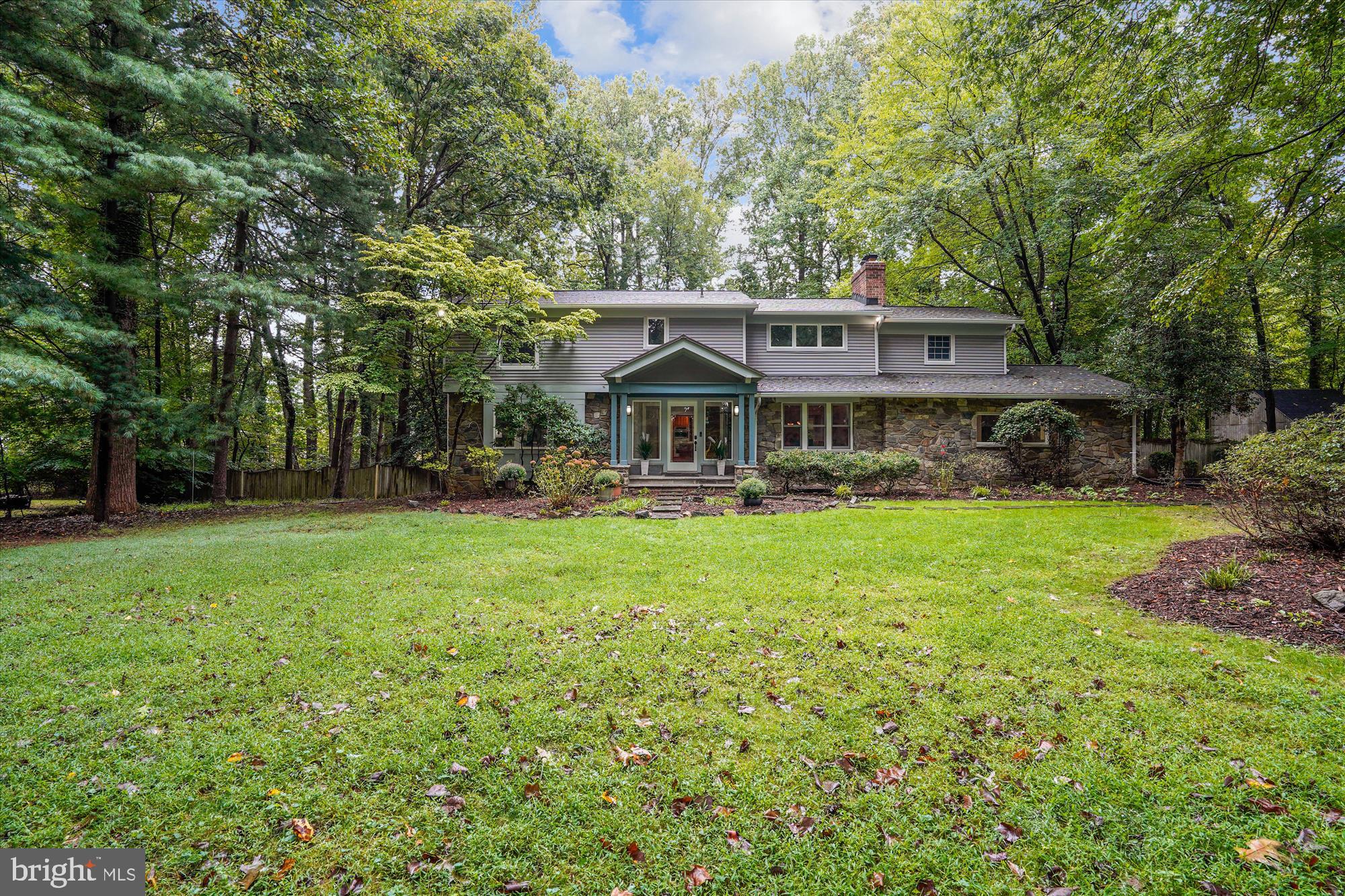 2559 Five Oaks Road Vienna, VA 22181 - Photo 41 of 55 a front view of a house with garden