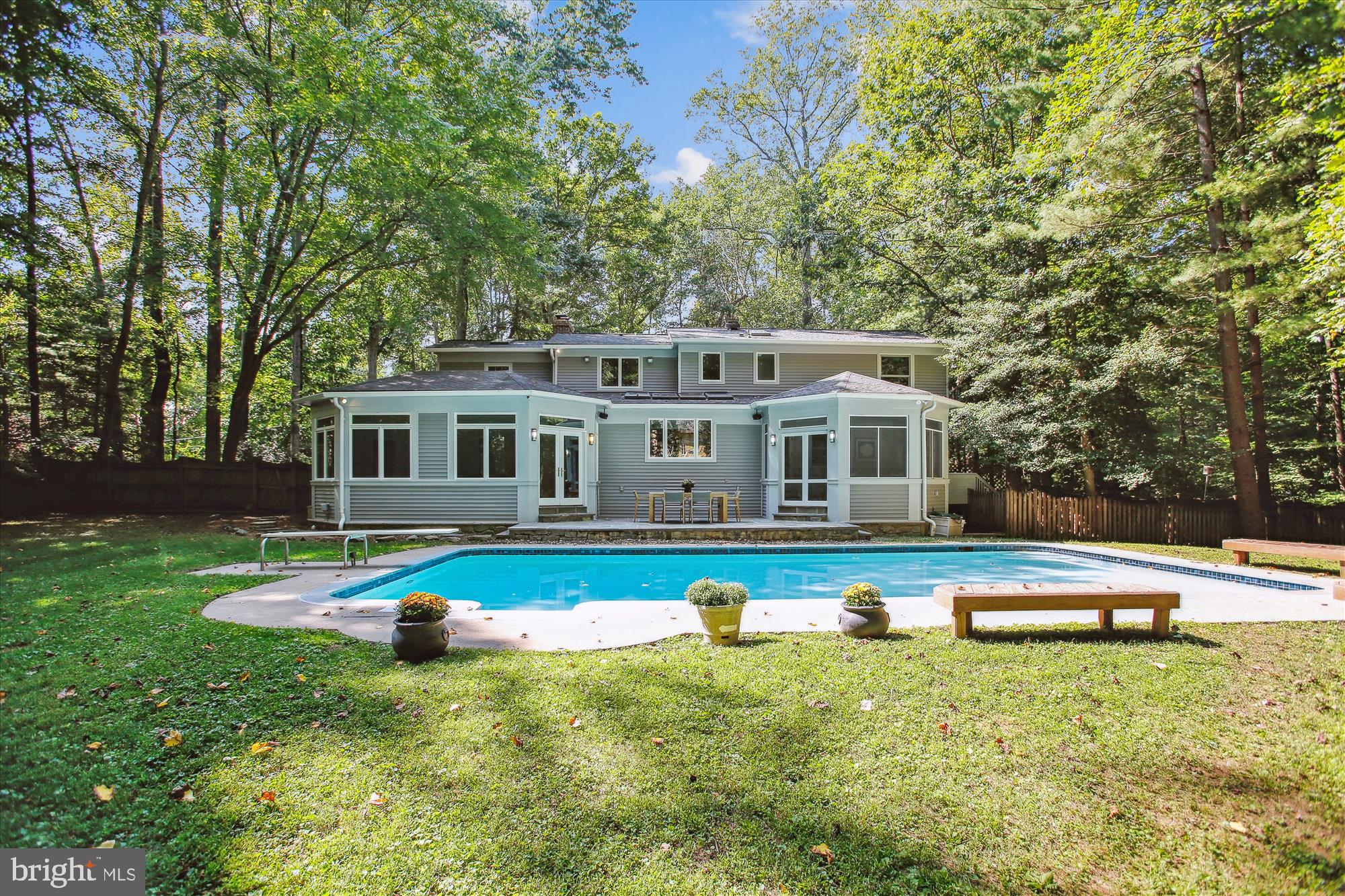 2559 Five Oaks Road Vienna, VA 22181 - Photo 42 of 55 a front view of house with yard and swimming pool