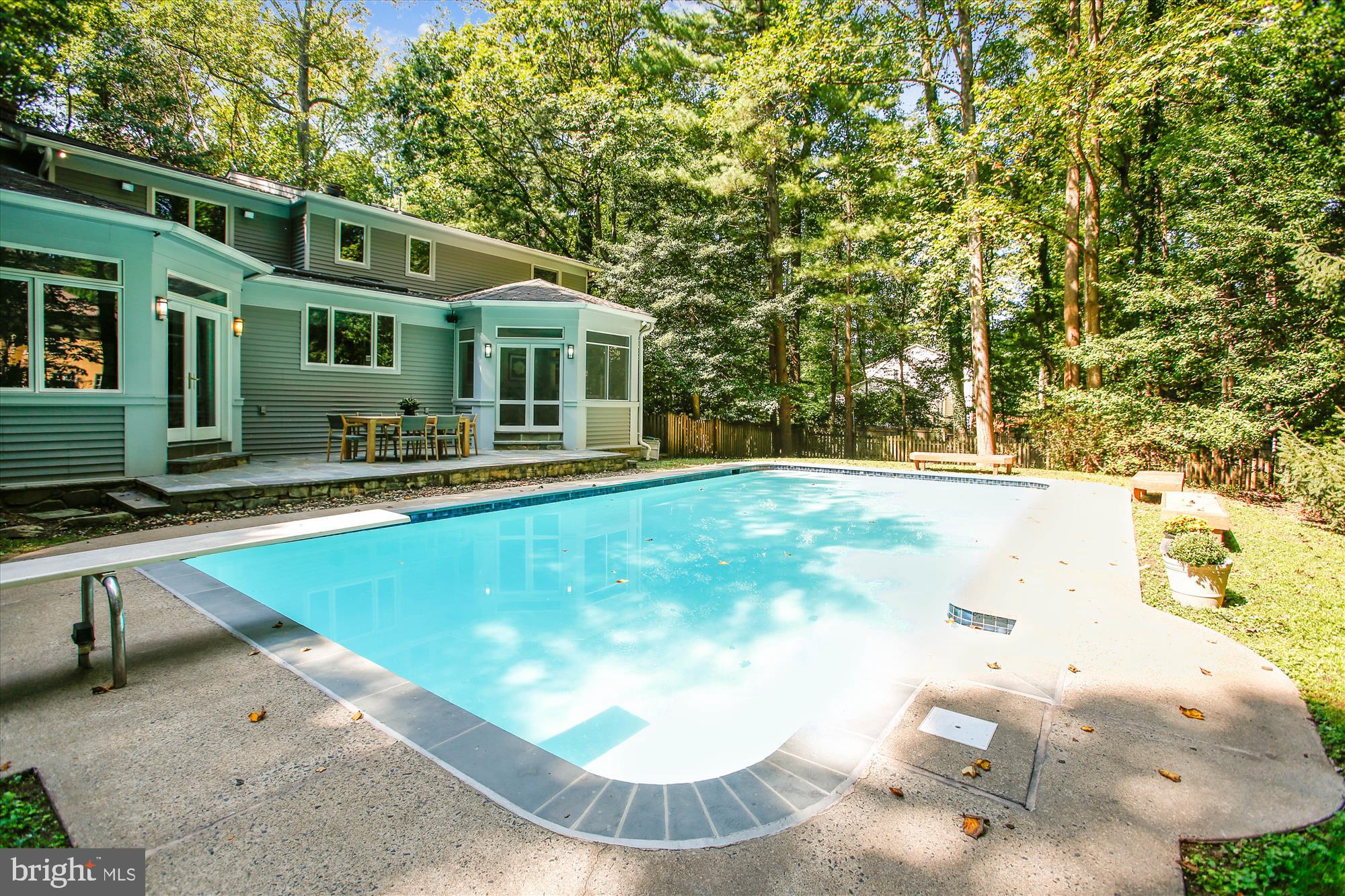 2559 Five Oaks Road Vienna, VA 22181 - Photo 49 of 55 a front view of a house with a yard