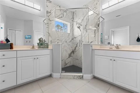a bathroom with a sink and mirror
