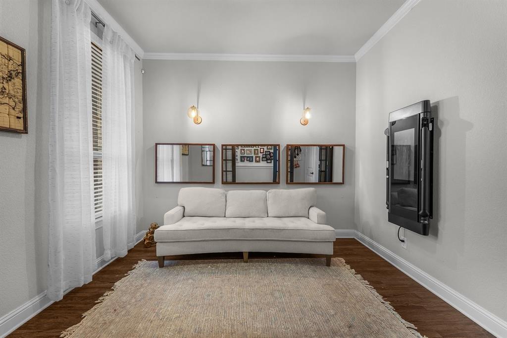228 Parc Oaks Drive Aledo, TX 76008 - Photo 18 of 40 a living room with furniture and a large window