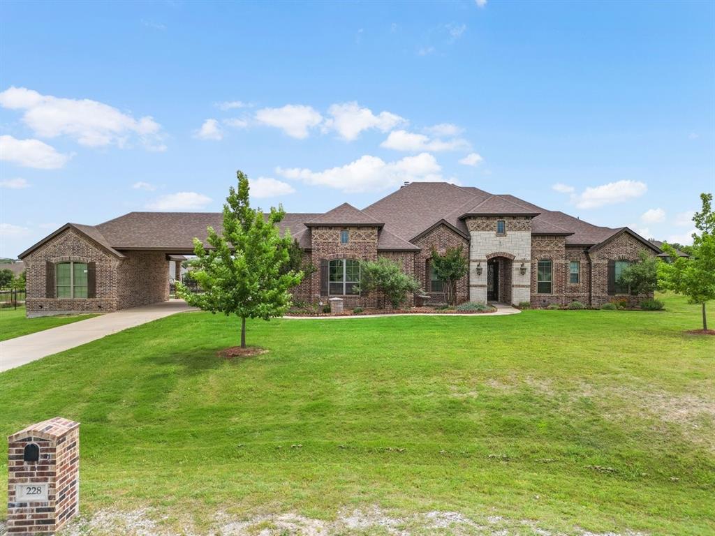228 Parc Oaks Drive Aledo, TX 76008 - Photo 2 of 40 a view of a house with a yard