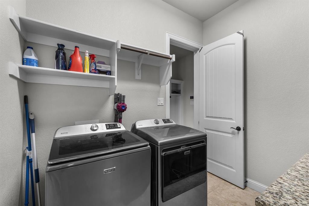 228 Parc Oaks Drive Aledo, TX 76008 - Photo 28 of 40 a utility room with dryer and washer