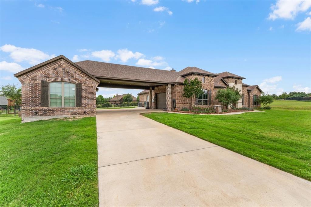 228 Parc Oaks Drive Aledo, TX 76008 - Photo 36 of 40 a front view of house with yard and green space