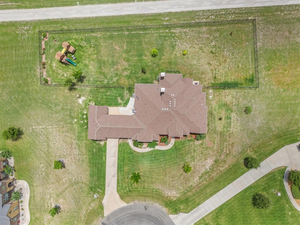 228 Parc Oaks Drive Aledo, TX 76008 - Photo 38 of 40 an aerial view of residential houses with outdoor space and swimming pool