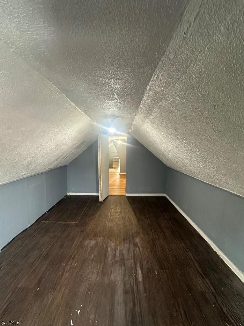 426 Franklin Street, Unit 2 Elizabeth Port, NJ 07206 - Photo 15 of 18 a view of an empty room and wooden floor