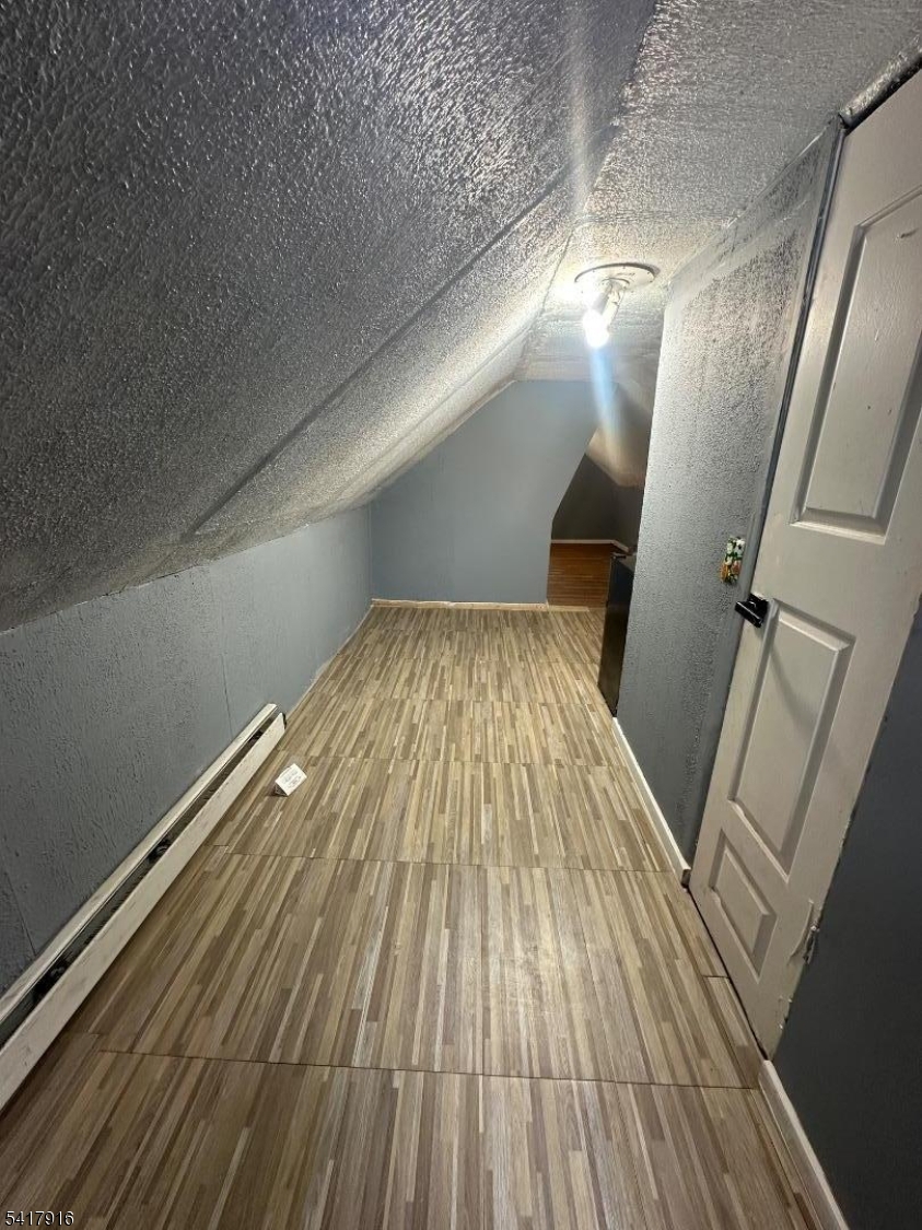 426 Franklin Street, Unit 2 Elizabeth Port, NJ 07206 - Photo 17 of 18 a view of wooden floor in a room