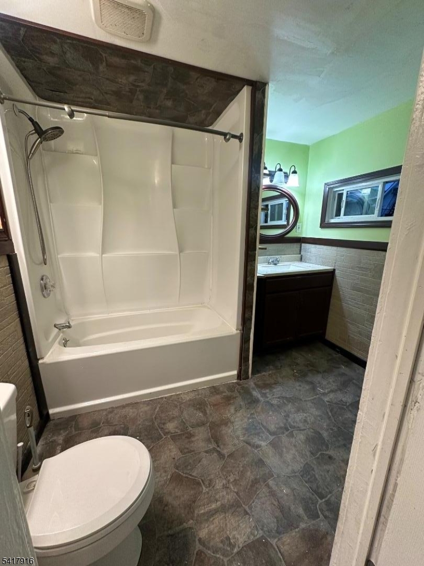426 Franklin Street, Unit 2 Elizabeth Port, NJ 07206 - Photo 3 of 18 a bathroom with toilet sink and shower