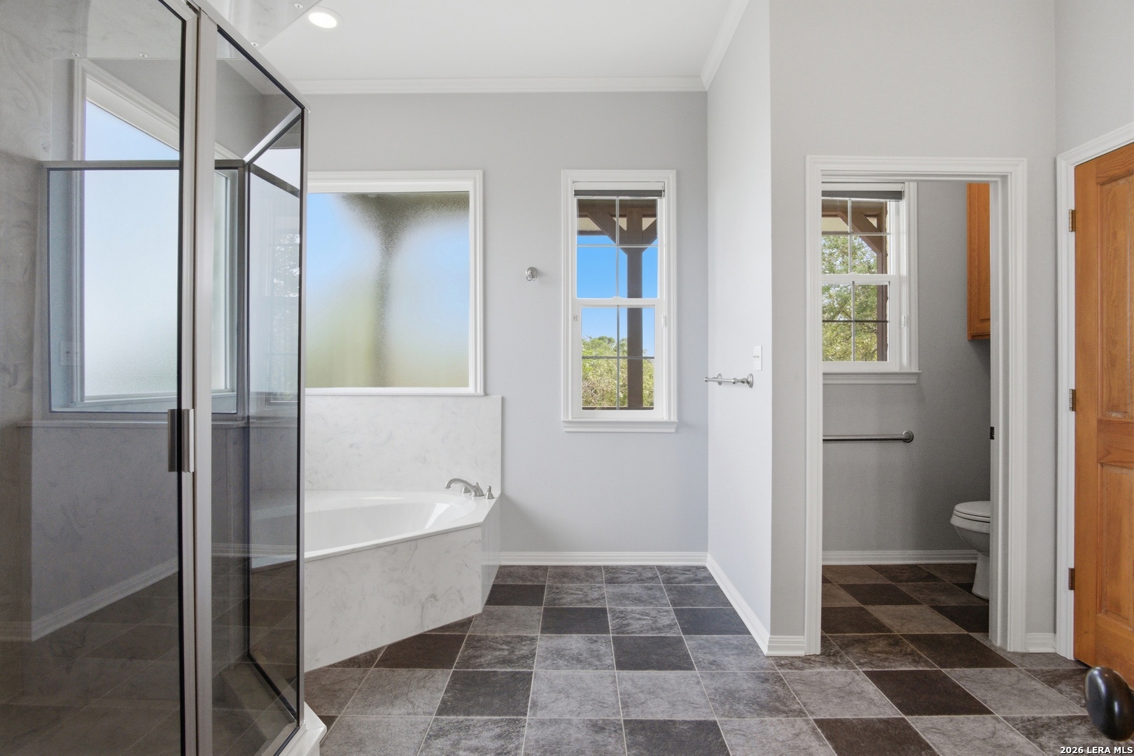 26 Seewald Road Boerne, TX 78006 - Photo 27 of 33 a bathroom with a bathtub and a shower