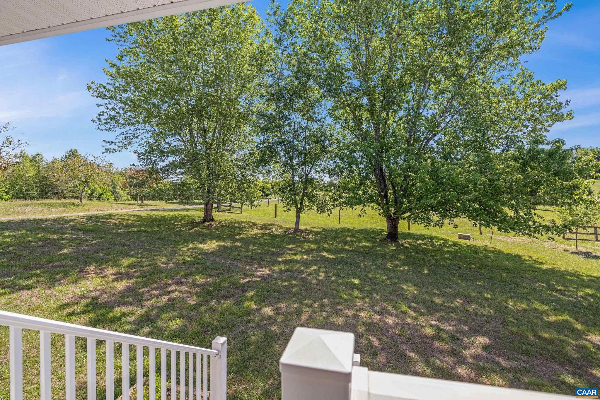 1075 Social Hall Road New Canton, VA 23123 - Photo 35 of 64 a view of a yard with trees in the background