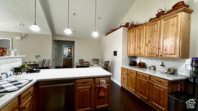 929 West 1920 South, Unit A Syracuse, UT 84075 - Photo 23 of 26 Kitchen featuring pendant lighting, black dishwasher, dark wood-type flooring, and decorative backsplash