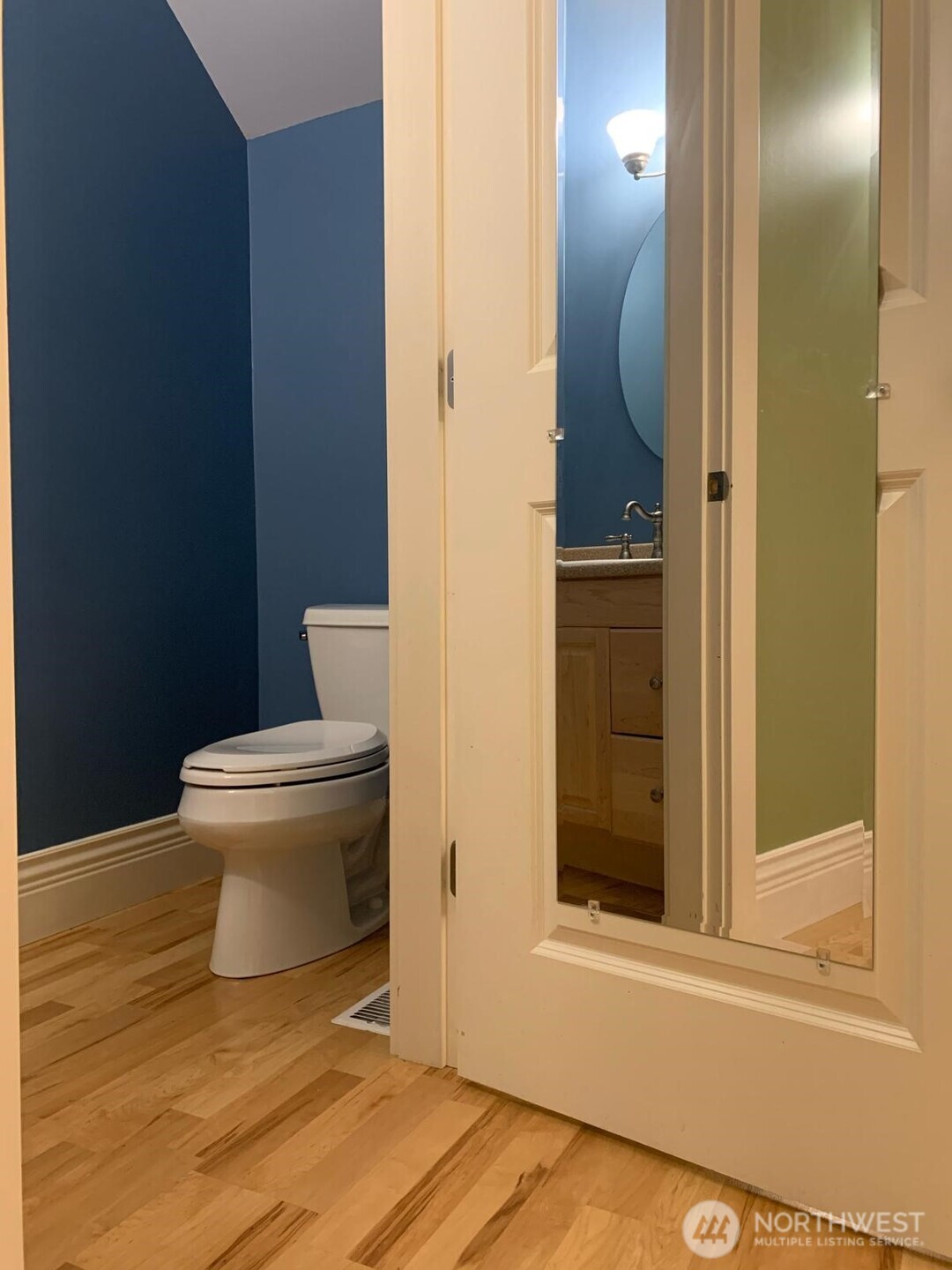 125 Park Drive Point Roberts, WA 98281 - Photo 14 of 27 a bathroom with a toilet and a mirror