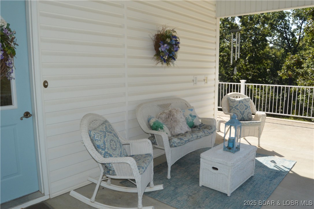 112 Rush Road Eldon, MO 65026 - Photo 15 of 50 Large covered deck is the perfect spot to enjoy yo