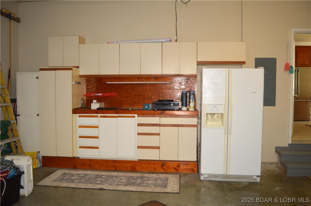 112 Rush Road Eldon, MO 65026 - Photo 36 of 50 Work area and storage in your garage.