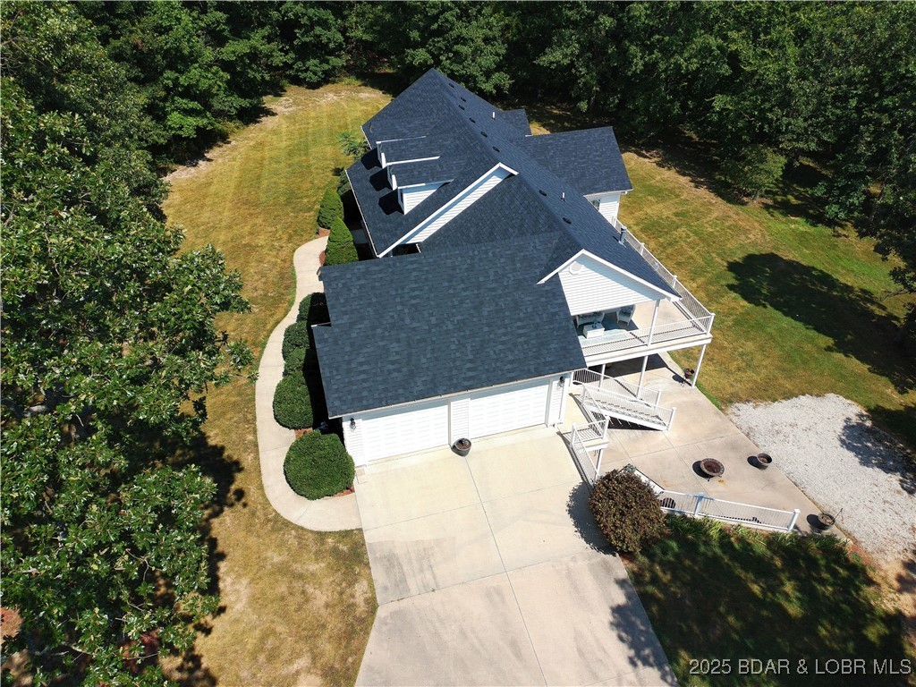 112 Rush Road Eldon, MO 65026 - Photo 48 of 50 Easy access to 2 car garage with plenty of excess