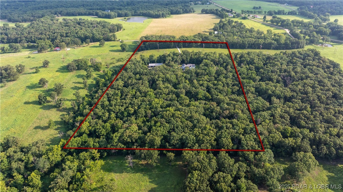 112 Rush Road Eldon, MO 65026 - Photo 5 of 50 Acreage is both open and wooded