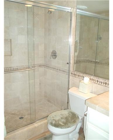 13666 Quinton Road San Diego, CA 92129 - Photo 11 of 25 Upgraded First Floor Bathroom Features Travertine Tile, New Fixtures