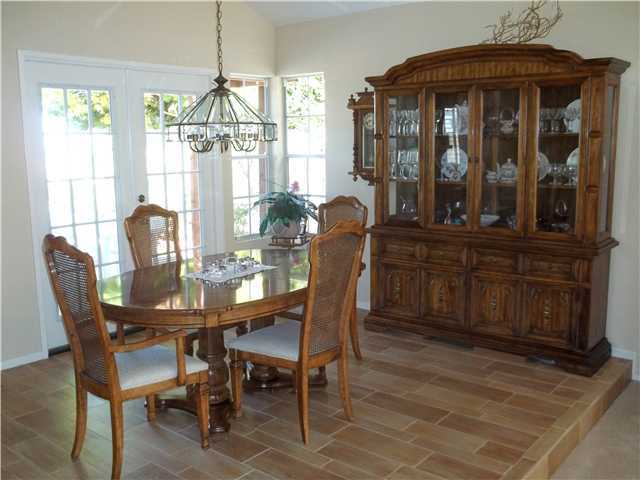 13666 Quinton Road San Diego, CA 92129 - Photo 7 of 25 Dining Area Features Simulated Wood Tile Flooring