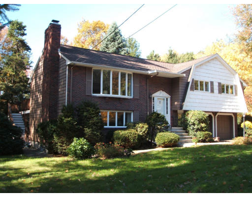 35 Philip Road Lexington, MA 02421 - Photo 1 of 1 a front view of a house with a yard