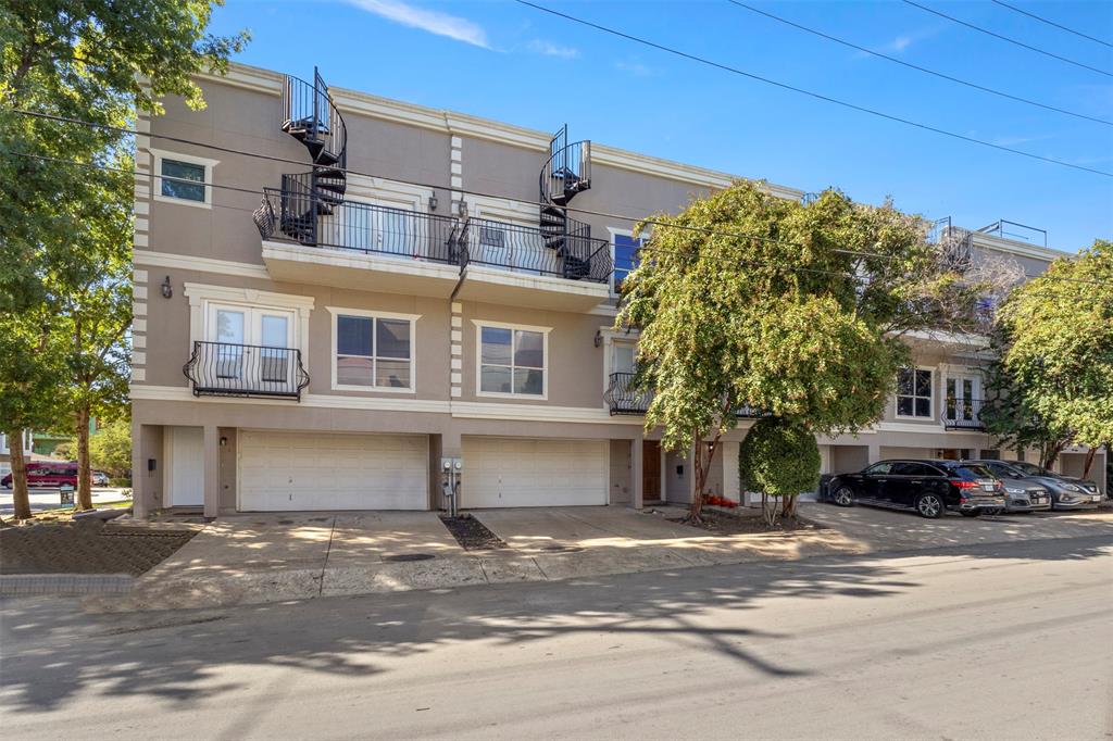 a view of a building with a street