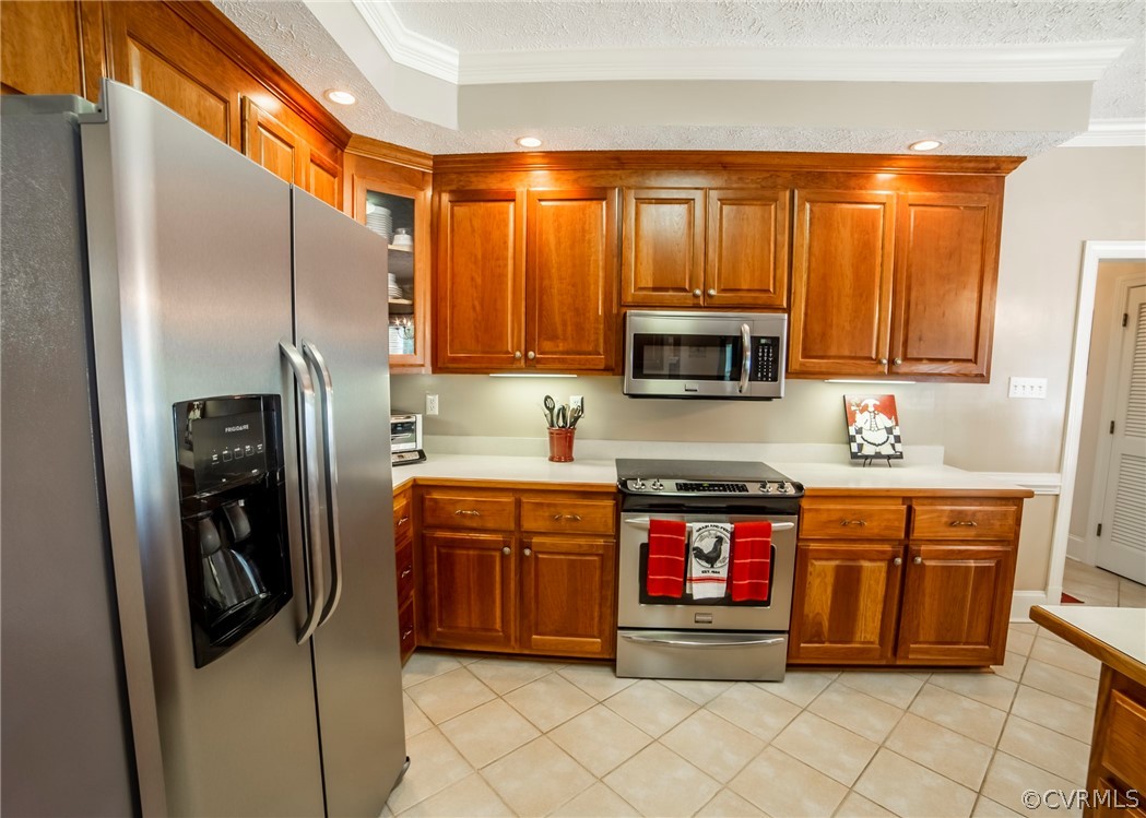 11239 Hanover Courthouse Road Hanover, VA 23069 - Photo 13 of 50 a kitchen with stainless steel appliances granite countertop a refrigerator and a stove top oven