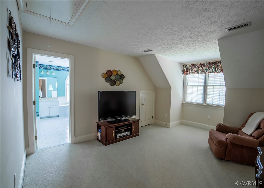 11239 Hanover Courthouse Road Hanover, VA 23069 - Photo 25 of 50 a living room with furniture and a flat screen tv
