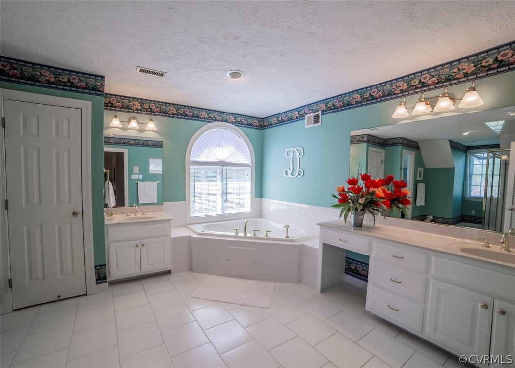 11239 Hanover Courthouse Road Hanover, VA 23069 - Photo 26 of 50 a spacious en suite bathroom with a double vanity sink and a large mirror