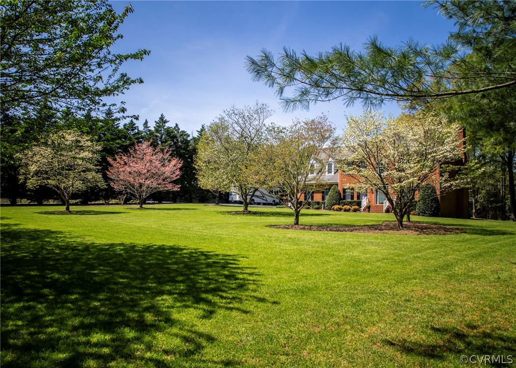 11239 Hanover Courthouse Road Hanover, VA 23069 - Photo 48 of 50 a view of a golf course with a lake view