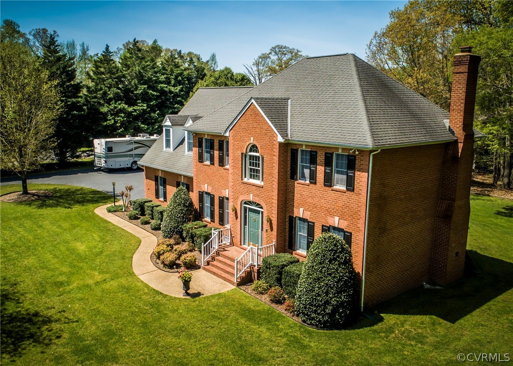 11239 Hanover Courthouse Road Hanover, VA 23069 - Photo 50 of 50 a aerial view of a house with a yard table and chairs