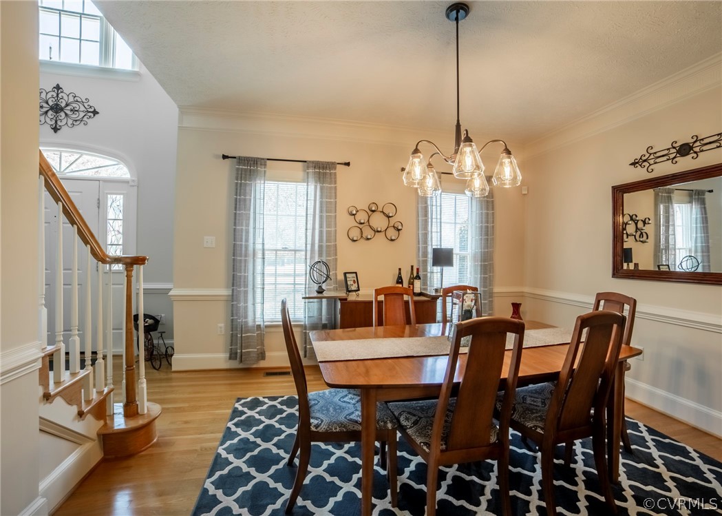 11239 Hanover Courthouse Road Hanover, VA 23069 - Photo 8 of 50 a view of a dining room with furniture and wooden floor