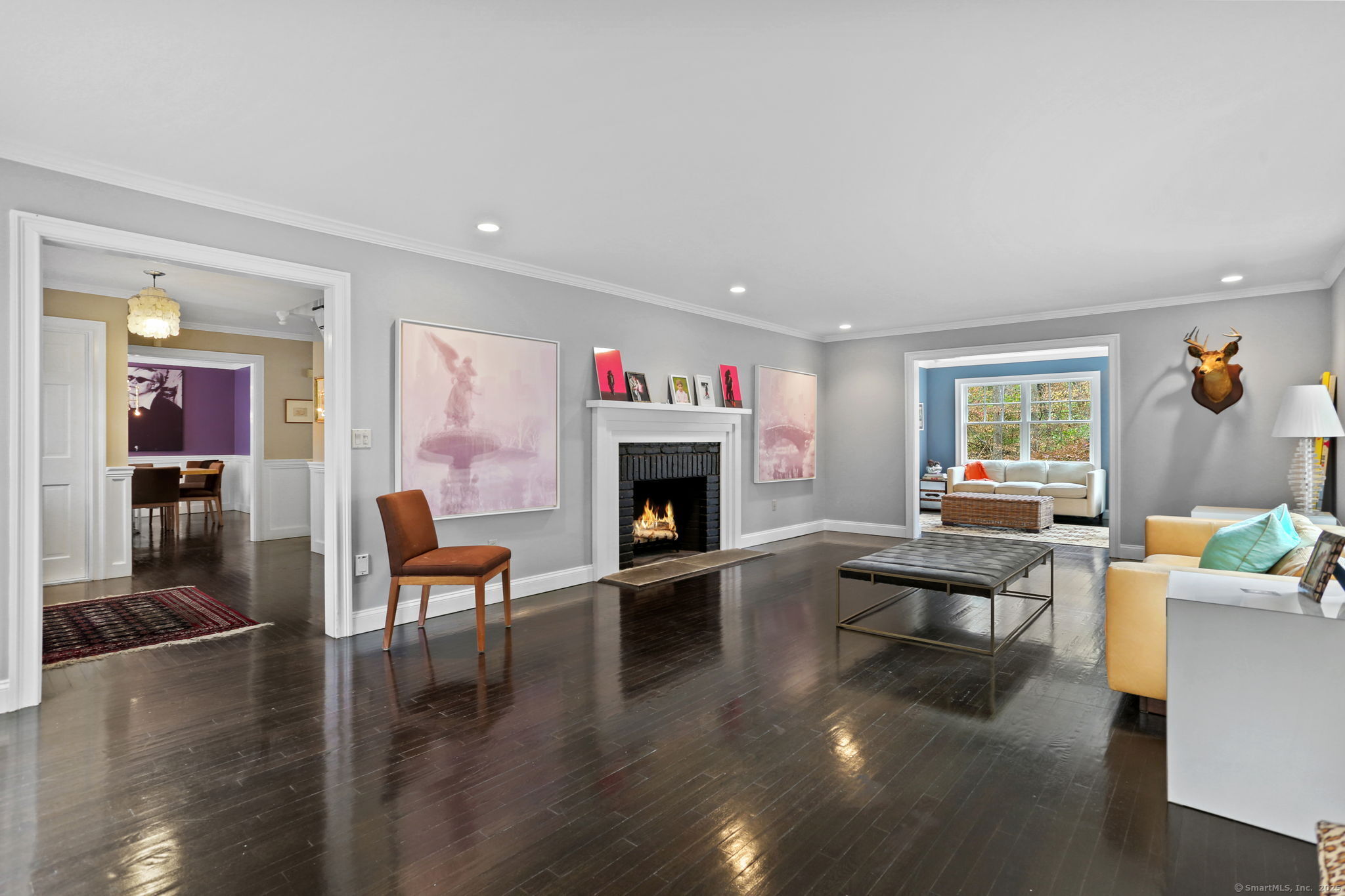 31 White Birch Road Weston, CT 06883 - Photo 11 of 37 a living room with furniture large window and fireplace