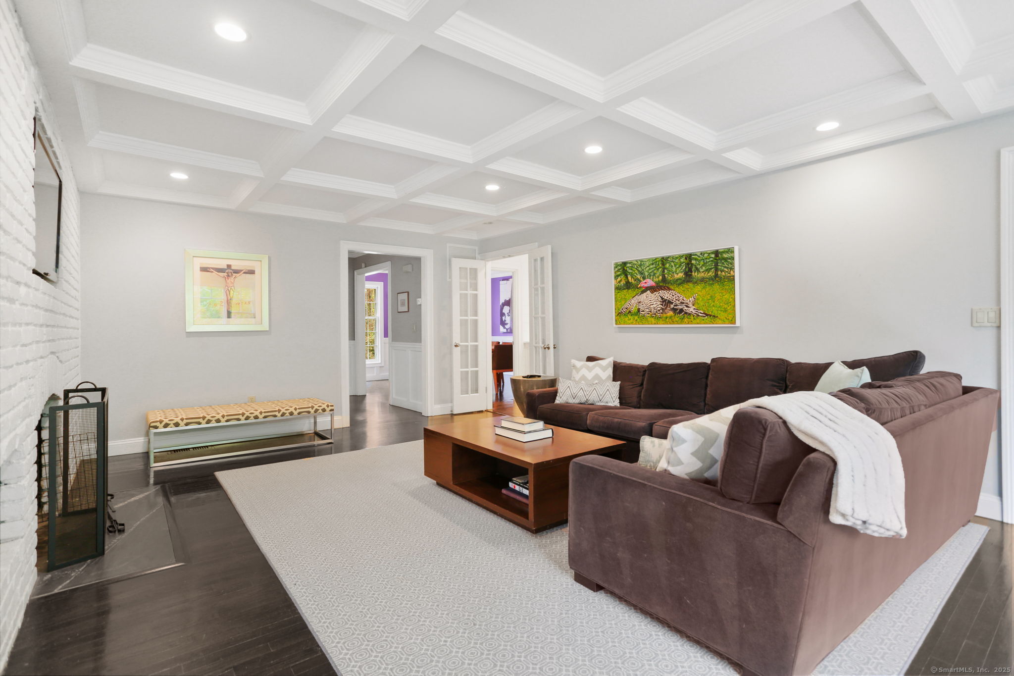 31 White Birch Road Weston, CT 06883 - Photo 15 of 37 a living room with furniture and a flat screen tv