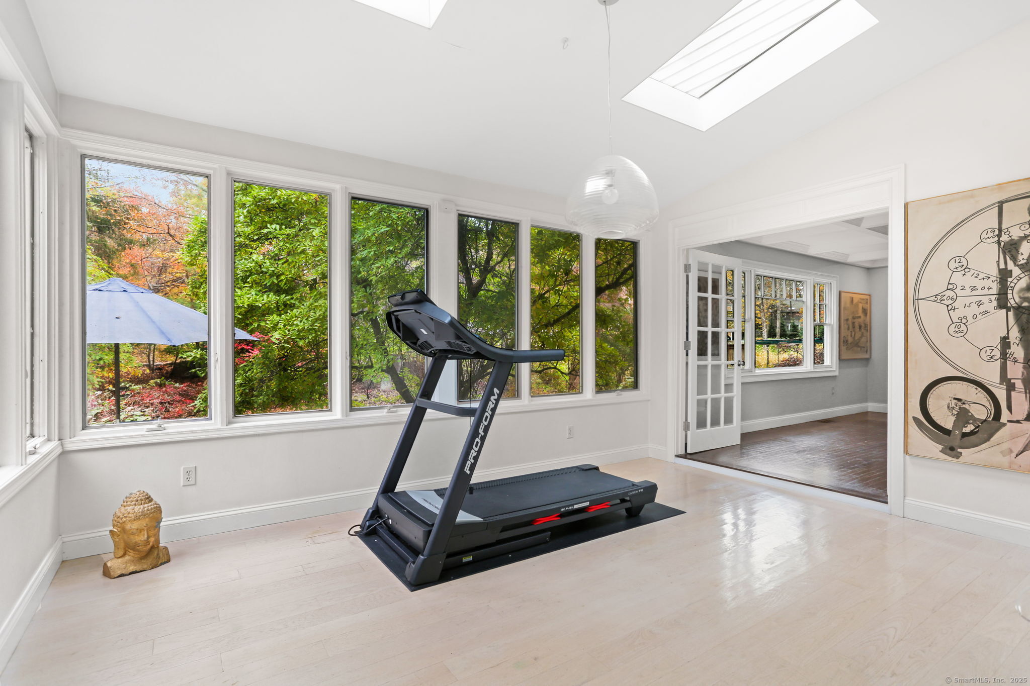 31 White Birch Road Weston, CT 06883 - Photo 20 of 37 a view of a room with gym equipment