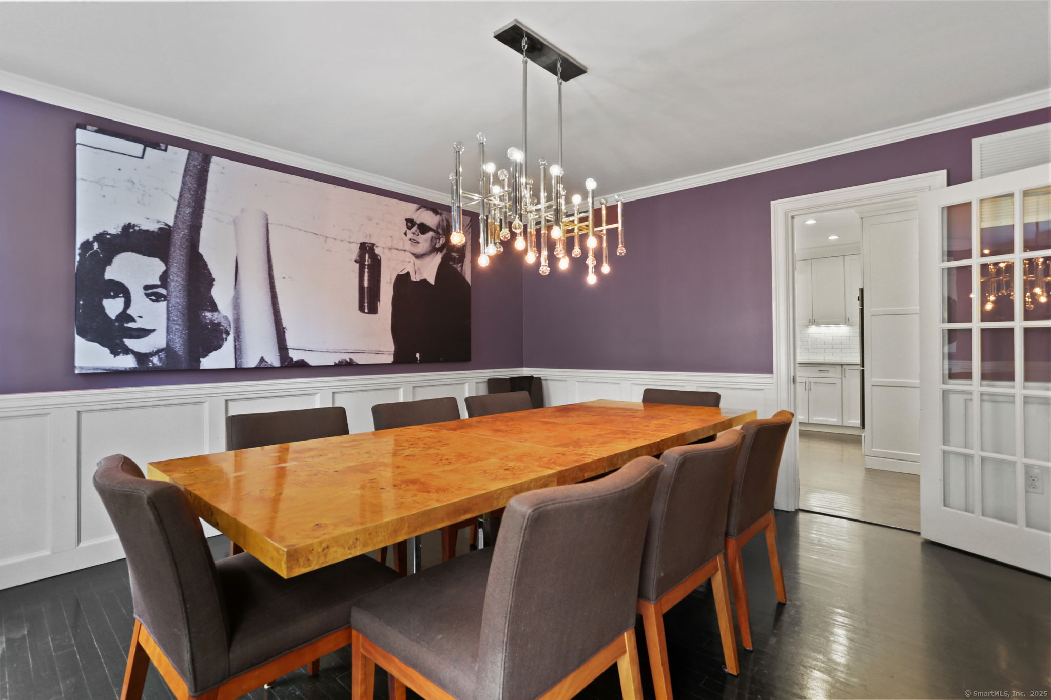 31 White Birch Road Weston, CT 06883 - Photo 21 of 37 a dining room with furniture a chandelier and wooden floor